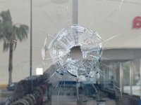 Detienen a dos por balear negocio al Oriente de M&eacute;rida