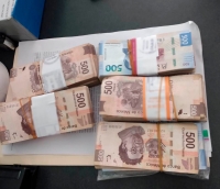 Detienen a mujer con casi medio millón de pesos en Aeropuerto de Mérida